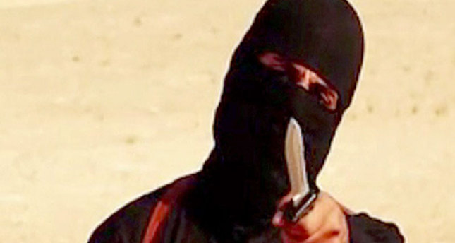 Masked ISIS executioner named by media as London man Mohammed.