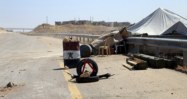 A checkpoint that belonged to Assad’s forces is seen after a coalition of rebel groups called Jaish al Fateh said they took control of it, on a highway that connects Aleppo to Latakia, June 6, 2015 (Reuters)