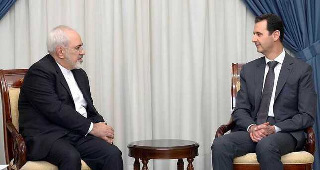 イランは2週間前にダマスカスでアサド（R）とイランの外相ジャヴァドZarif（L）との間の会議でアサドの支持を更新しました。