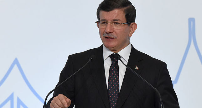PM Davutoğlu delivers a speech during a press conference with Bulgarian Prime Minister during the 8th Global Forum on Migration and Development Submit on October 14, 2015 in Istanbul. (AFP photo)
