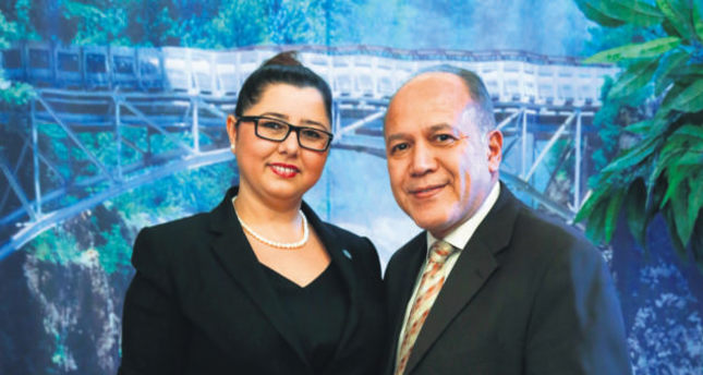 Derya Taşkın (L) poses with Mayor Jose Torres.