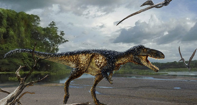 A life reconstruction of the new tyrannosaur Timurlengia euotica, accompanied by two flying reptiles (Azhdarcho longicollis) in their environment 90 million years ago, is pictured in this undated illustration released on March 14 (Reuters Photo)