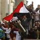 Egyptians defy curfew to call for Mubarak to go