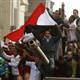 Egyptians defy curfew to call for Mubarak to go