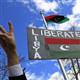 U.S. hits Libya with sanctions, shuts embassy