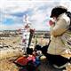 Japan's nuclear plant operator pays "condolence money"