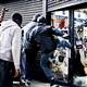 London police hold the line but looters free to steal