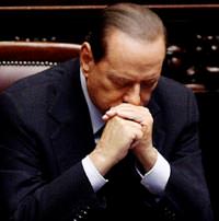 Berlusconi faces crunch vote, pressure to quit