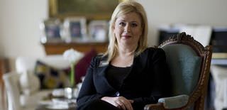 Arafat�s wife says life was hard with him and harder now