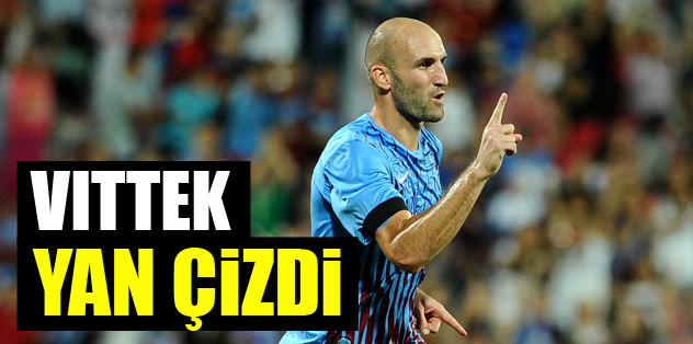 Vittek yan çizdi