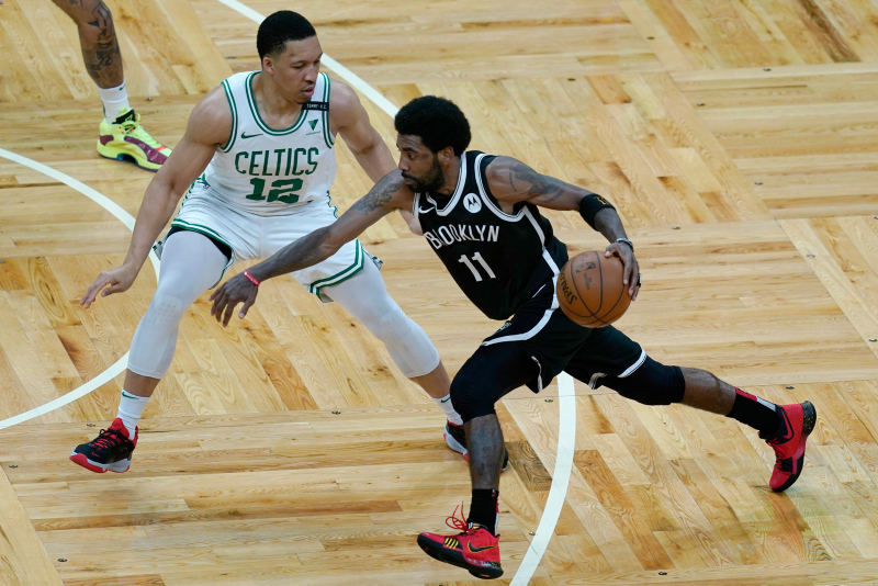 Celtics fan charged after throwing water bottle at Kyrie Irving