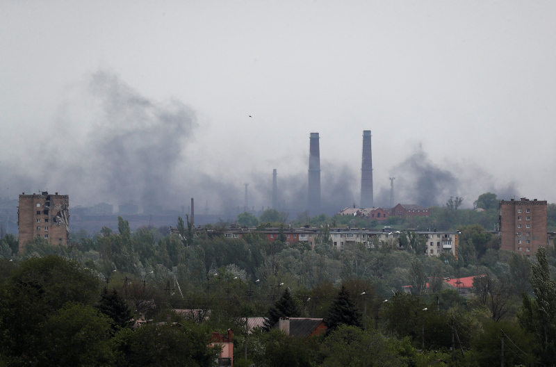 FILE PHOTO: Smoke rises above the Azovstal Iron and Steel Works during the Ukraine-Russia conflict in the southern port city of Mariupol, Ukraine May 13, 2022. REUTERS/Alexander Ermochenko/File Photo