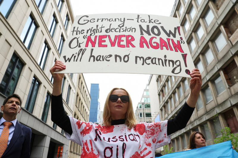 On Earth Day, climate activists rally against fossil fuels